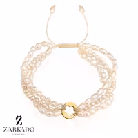 دستبند مرواریدی سه رج و پلاک طلا طرح گل