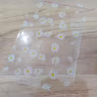 سلفون طرح بابونه سایز 13 در 16سانت (100گرم)