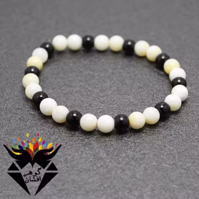 دستبند عقیق سیاه و صدف باباقوری براق کد D_1359