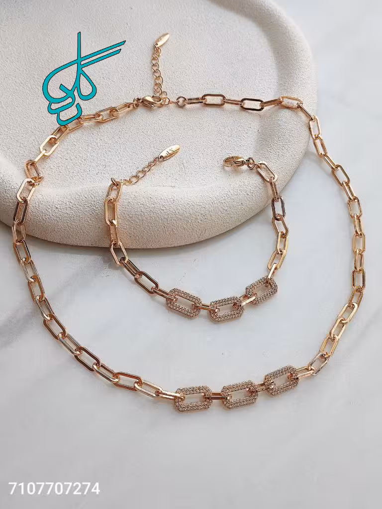 خرید سرویس گردنبند و دستبند مارک ژوپینگ نگین دار طلایی شیک رنگ ثابت ضد حساسیت آبکاری شده کیفیت عالی کد 2215242 - ردگل