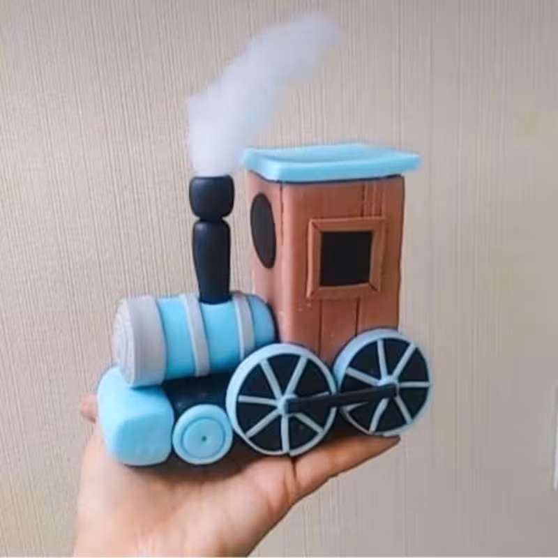 تاپر کیک و عروسک خمیر چینی طرح قطار قیمت فقط 180 تومن