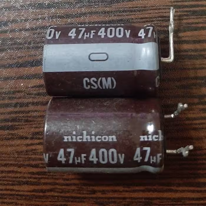 nichicon 400V 47uF – خازن الکترولیت، 400 ولت، 47 میکروفاراد، نیچیکون، سری CS