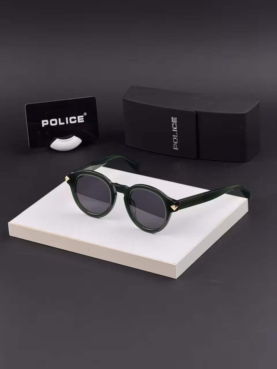 عینک آفتابی پلیس کد SPL31 فریم سبز عدسی مشکی