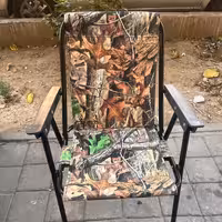 صندلی مسافرتی مدل مبلی و تاشو دسته دار با فوم نشیمنگاه طرح جنگل مناسب سفر  و ماشین کد1