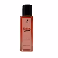 عطر جیبی الحمبرا مدل اسکندل SCANDAL حجم 30 میلی لیتر با رایحه گرم آبنباتی پاستیلی