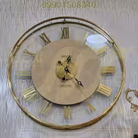 ساعت ديواري بتيس فلزي 50