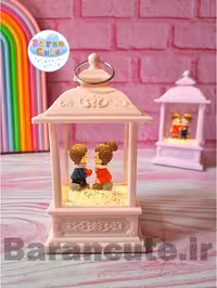 فانوس موزیکال چراغ دار طرح دختر و پسر نشسته