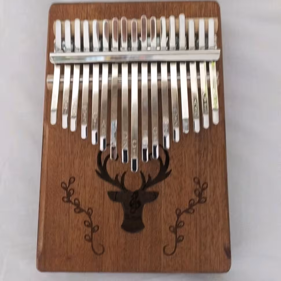 کالیمبا SNDطرح گوزن چوب ماهگونی تیغه خارجی به همراه جعبه و چکش و پارچه و ارسال سریع 