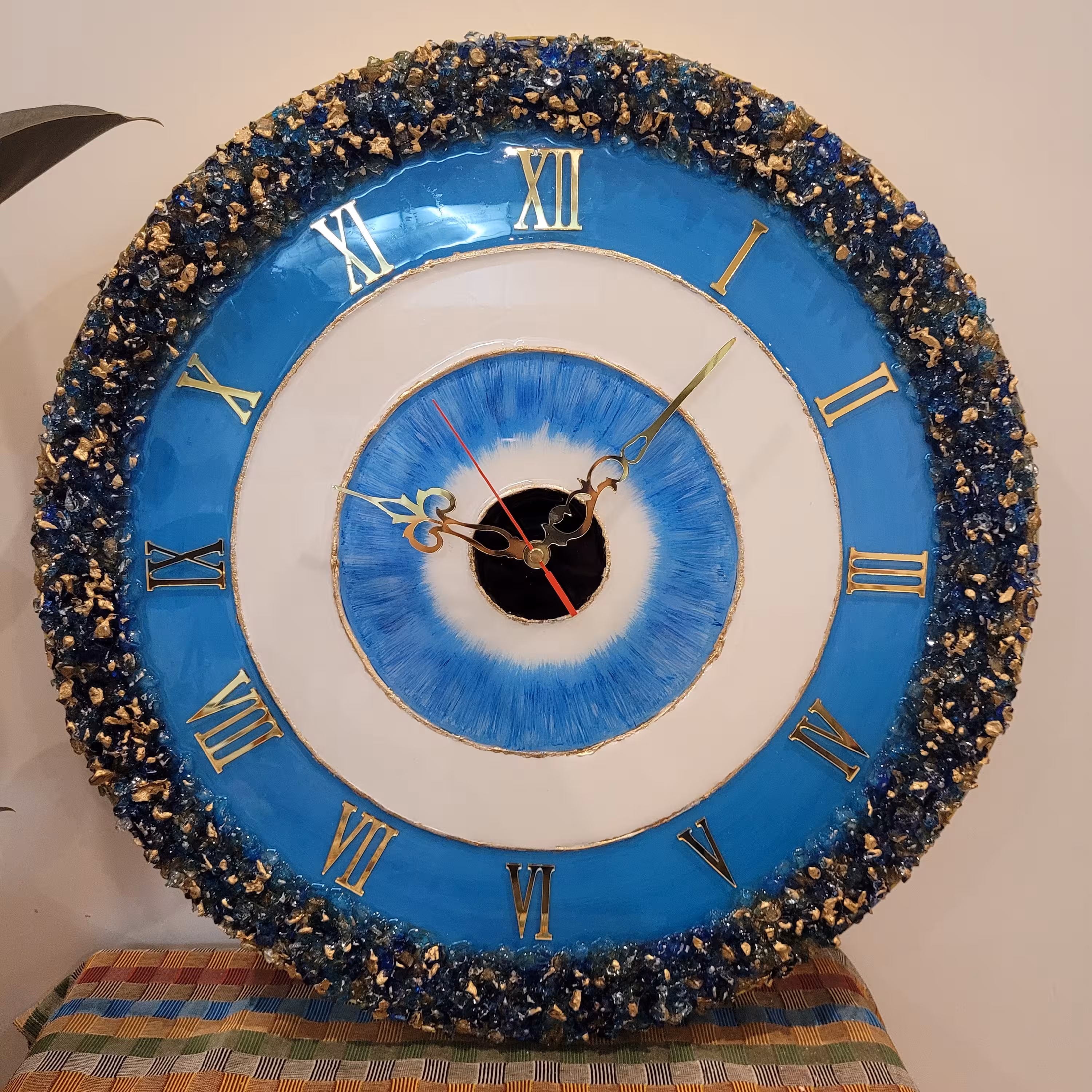 ساعت دیواری رزینی چشم نظر آبی قطر 50