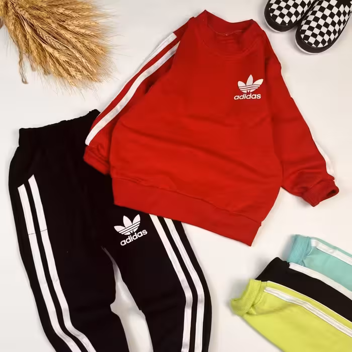 ست بلوز شلوار اسپرت آدیداس در 4 رنگ مشکی  قرمز فسفری و سبزآبی از  2 سال تا 14 سال