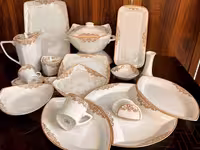 سرویس چینی پردیس طرح یلدا طلایی 105 پارچه 12 نفره