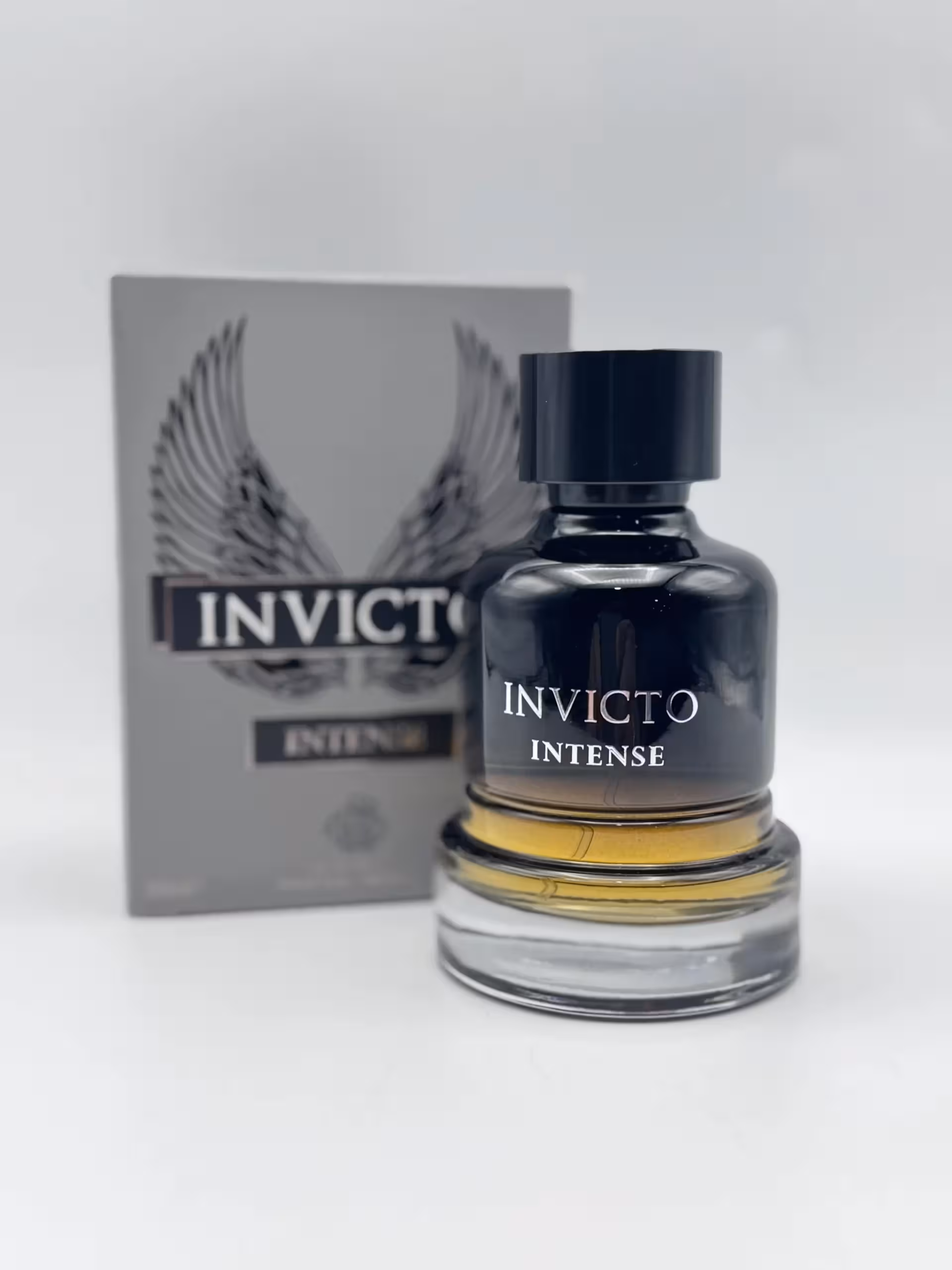 ادکلن اینوکتوس اینتنس طوسی فرگرانس ورد مردانه 100 میل(Fragrance world Invicto Intence)
