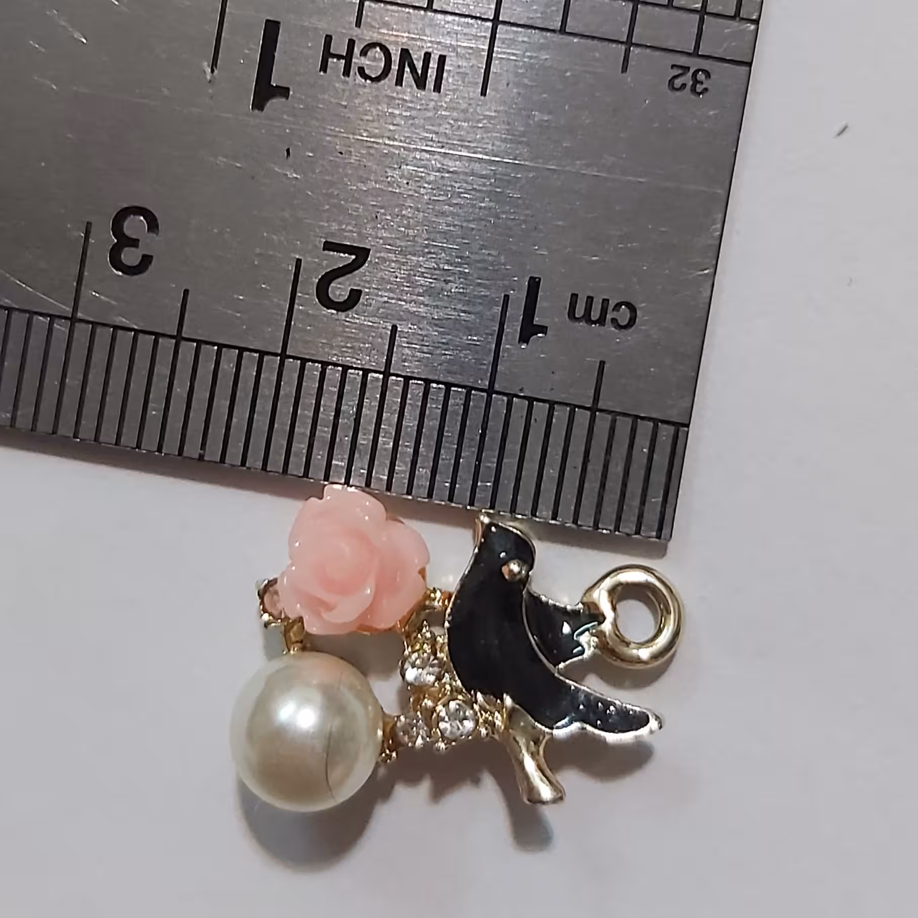 خرکارآویزپرنده وگل صورتی یک عدد