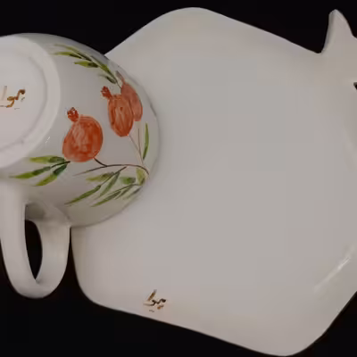 ست فنجان و نعلبکی سرامیکی هیوا طرح انار کد 11040895