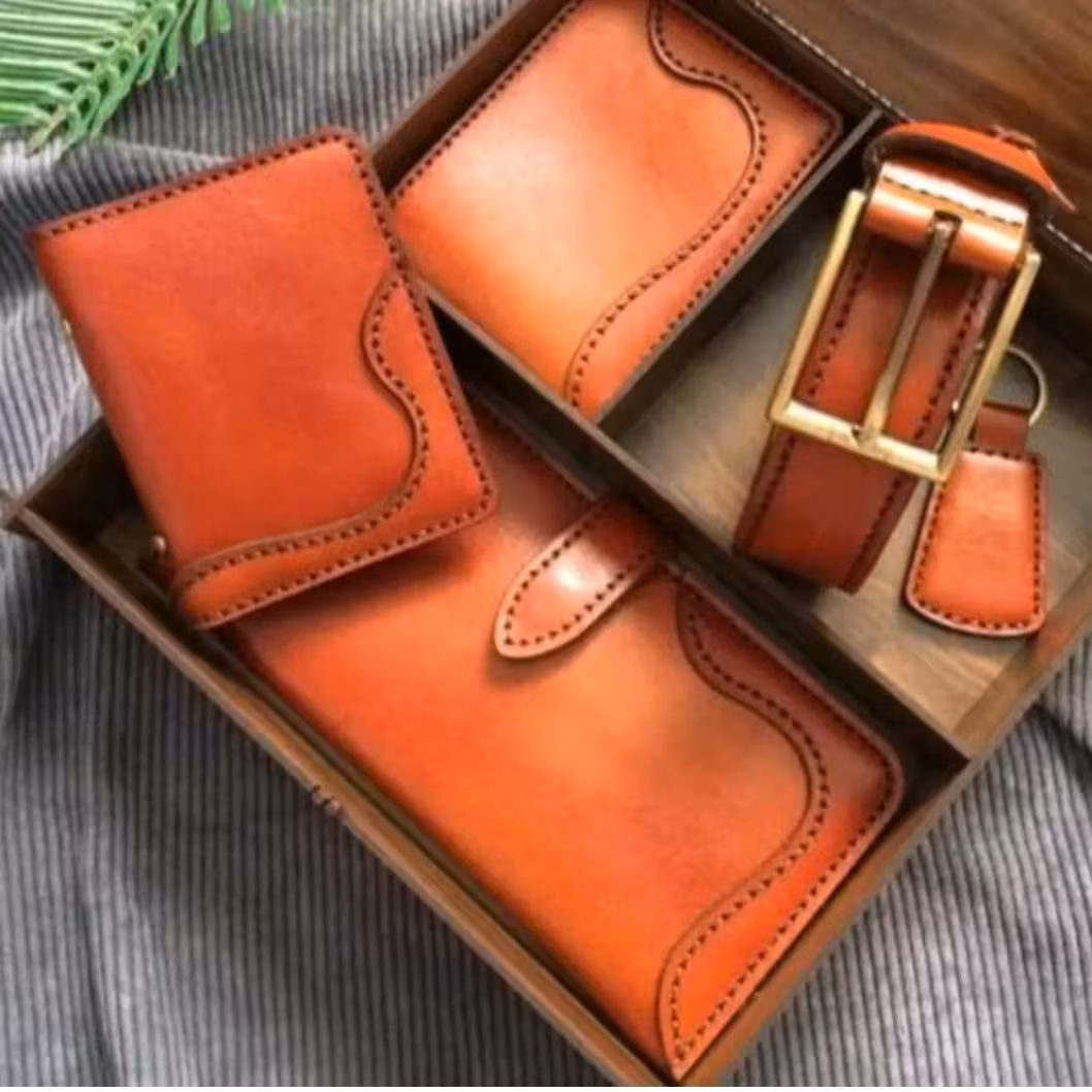 ست کیف وکمربند وکیف جیبی وجا کلید چرم طبیعی ودست دوز
