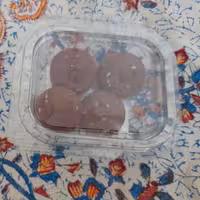 کوکی شکلاتی کنجدی ایتالیایی باتزئین ترافل شکلاتی به وزن خالص 40گرم تهیه توسط بنده صاحب غرفه خانه شیرینی 