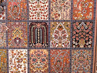 فرش ماشینی زمرد مشهد طرح خشتی مدل ترنج زمینه آبی