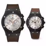 ساعت مچی ست هابلوت مردانه و زنانه موتور ژاپن قهوه ای مشکی مدل 582888