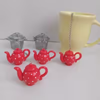 آویز صافی چای و دمنوش  طرح قوری بدون صافی استیل میباشد | amazonchi