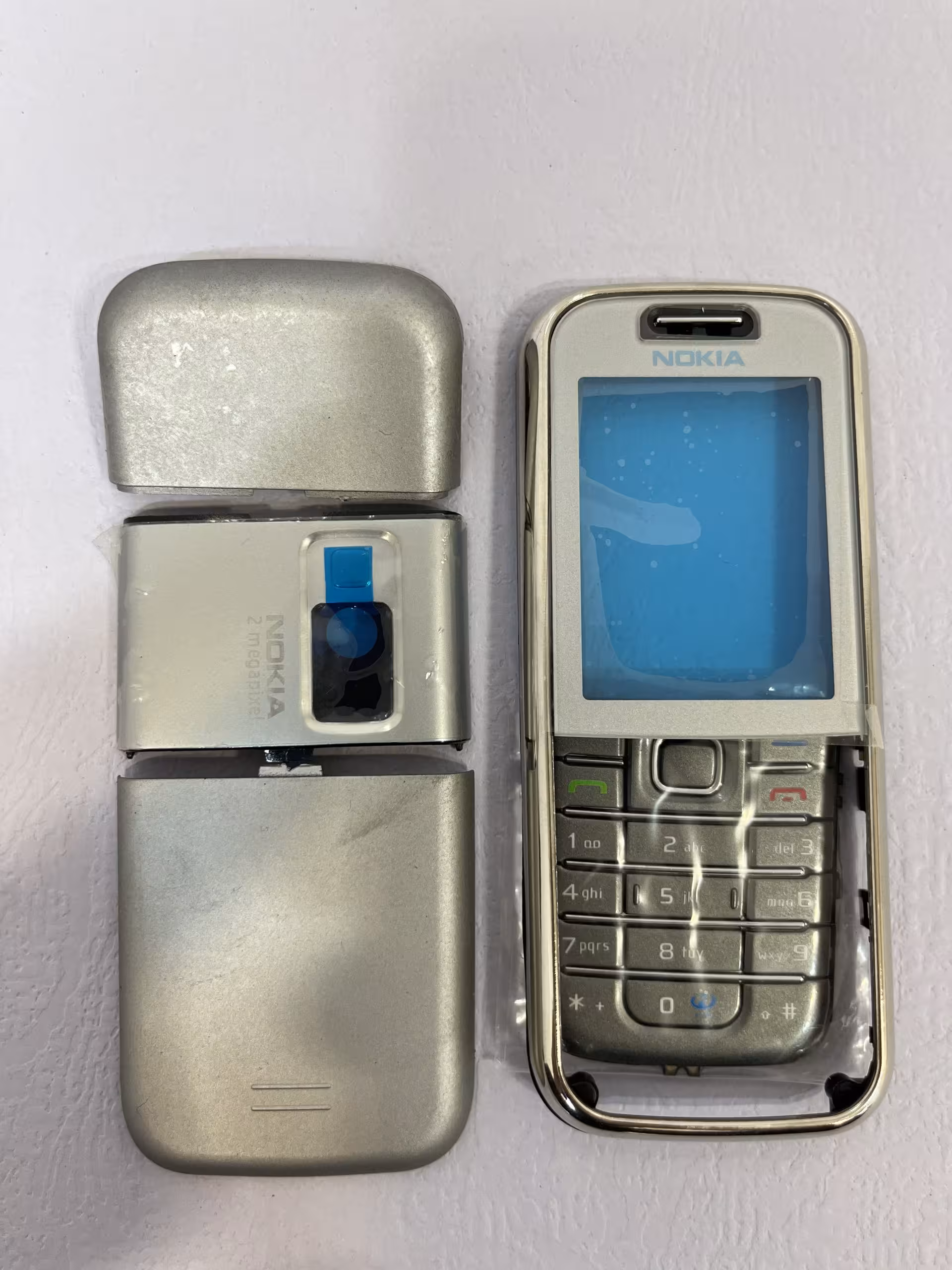 قاب نوکیا مدل Nokia 6233 کیفیت جنس : ساخت کره – های کپی درجه 1 نو و آکبند ( رنگ سیلور) کامل “اصالت کالا”:”ساخت کره – های کپی درجه 1″