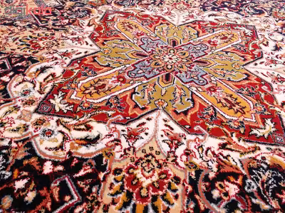 فرش ماشینی زمرد مشهد طرح خشتی مدل ترنج زمینه آبی