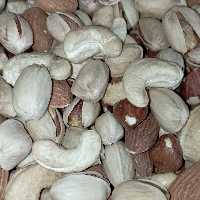 آجیل چهارمغز خام  بسته بندی 1 کیلوگرمی شالیزار صادق 