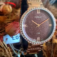 ساعت مچی زنانه گلف GOLF مدل L0199  رزگلد قاب  دور نگین   موتور ژاپن بهمراه کارت گارانتی معتبر ساعت عبدی