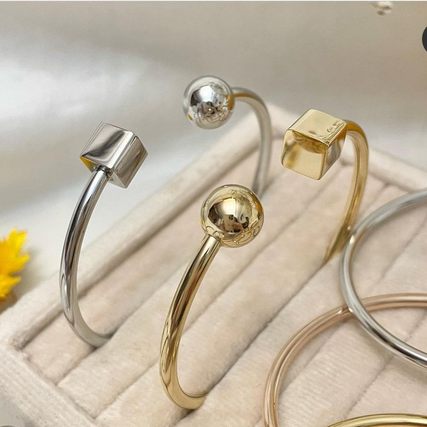 دستبند النگویی اسپرت استیل در دو رنگ طلایی و نقره ای دونه ای 150 هزار تومان