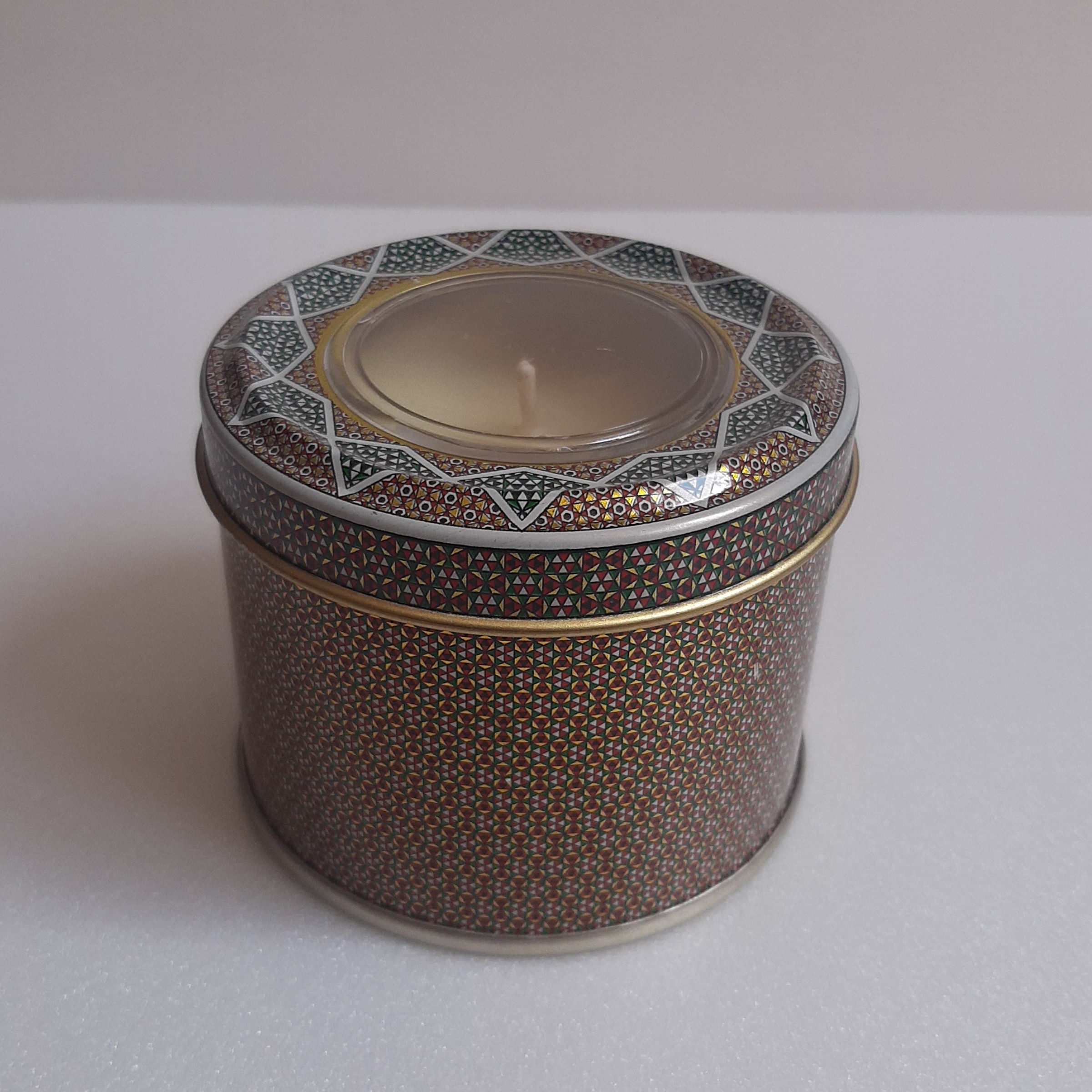 شمع ماساژ درمانی درجه 1  ظرف فلزی 130 گرم خالص 