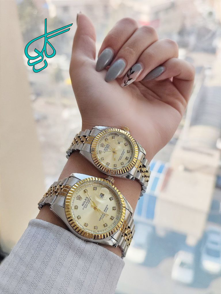 خرید ست ساعت زنانه و مردانه مارک رولکس تقویم دار رنگ ثابت صفحه طلایی قفل ضامن دار کد 2116372 - ردگل