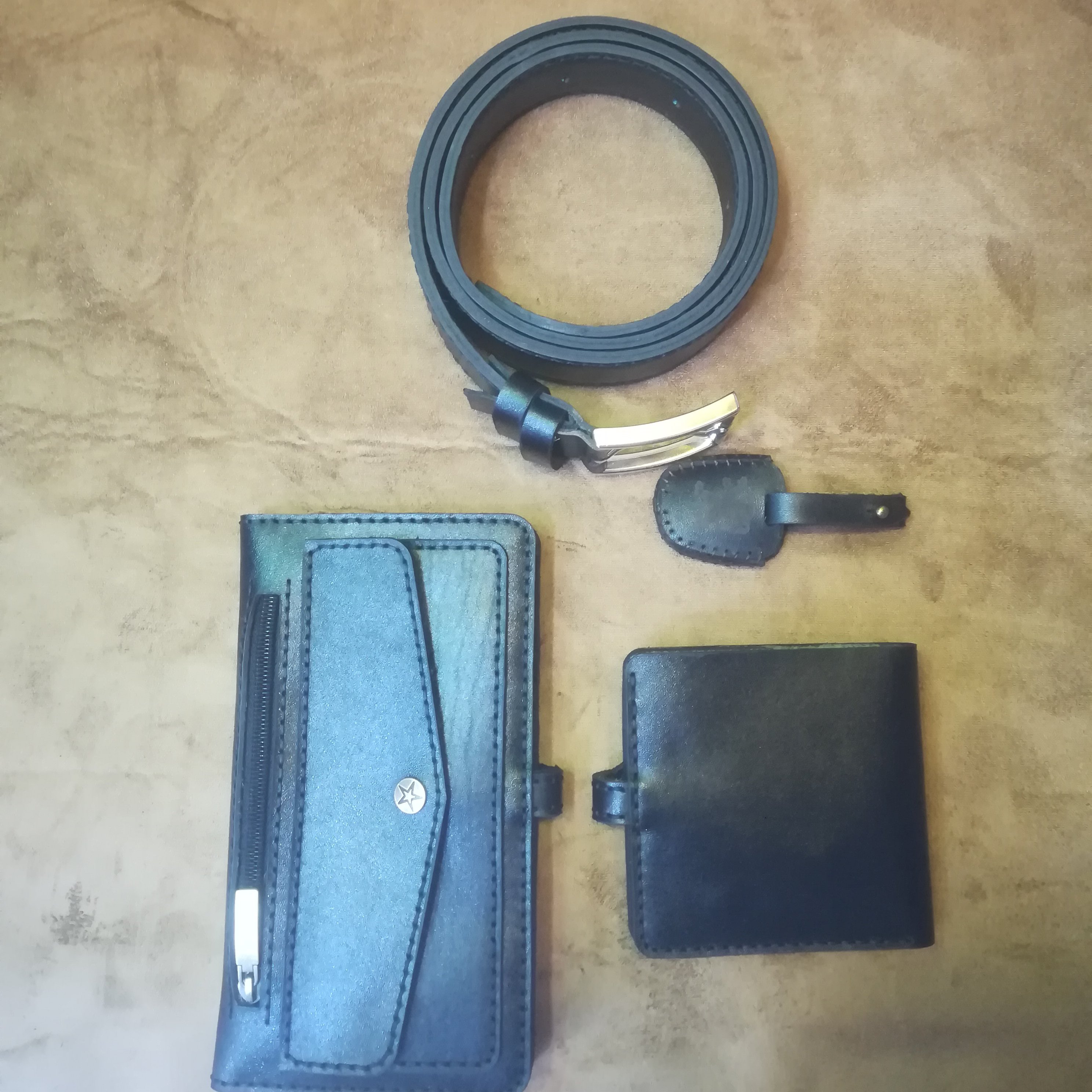 ست کیف و کمربند و کیف جیبی و ریموت و...