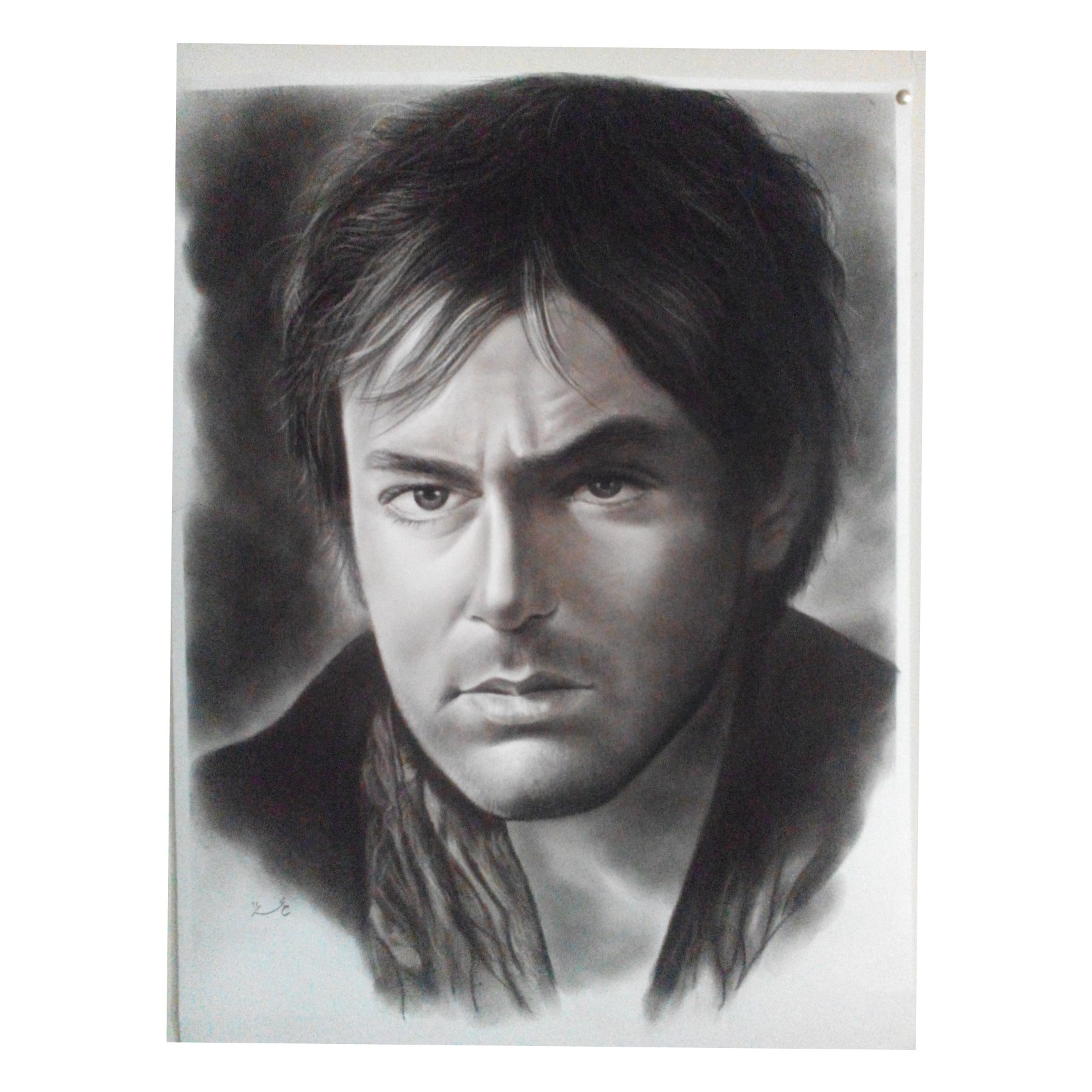 پرتره سیاه قلم هنرمند و بازیگر دانیال عبادی