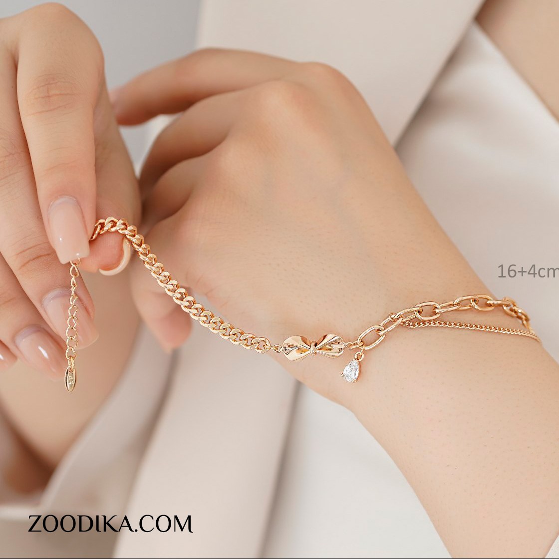 دستبند ژوپینگ مدل پاپیون طرح طلا رنگ ثابت ضد حساسیت کد AAD-308