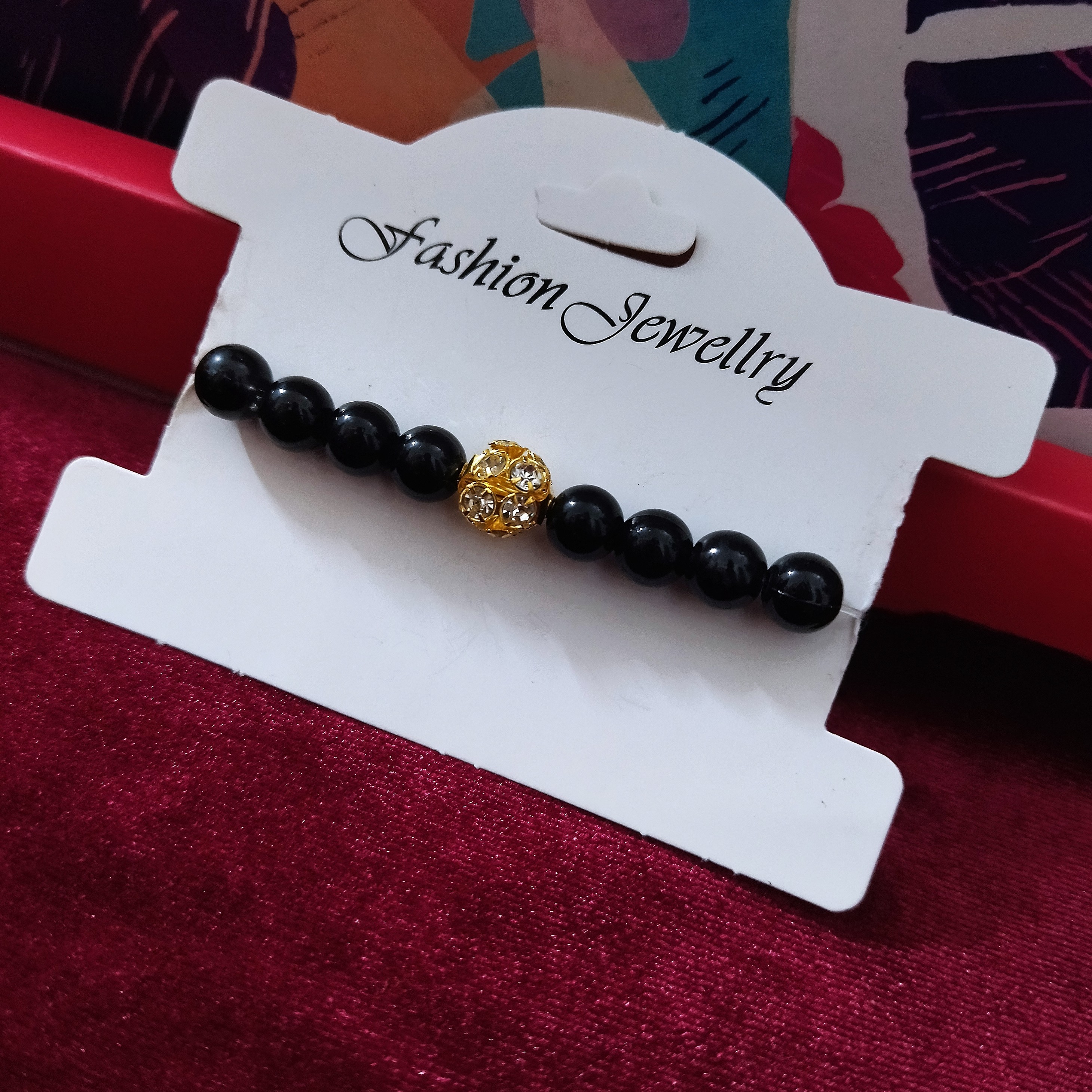 دستبند مرواریدی مشکی (نگینی)