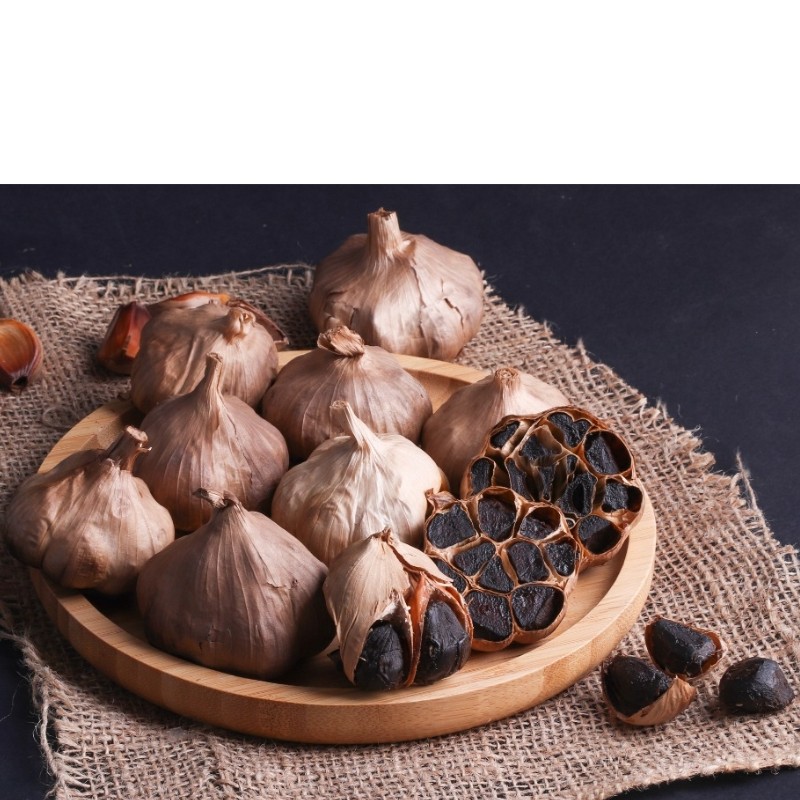 سیر سیاه بدون هیچ افزودنی سیر همدان تخمیر شده شیرین بدون بو سرشار از ویتامین