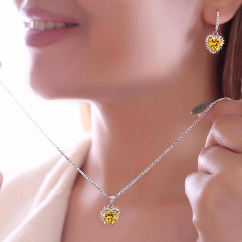 نیمست نقره طرح جواهر شامل گردنبند و  گوشواره نگین دار وزن 8.48 گرم کد SI003