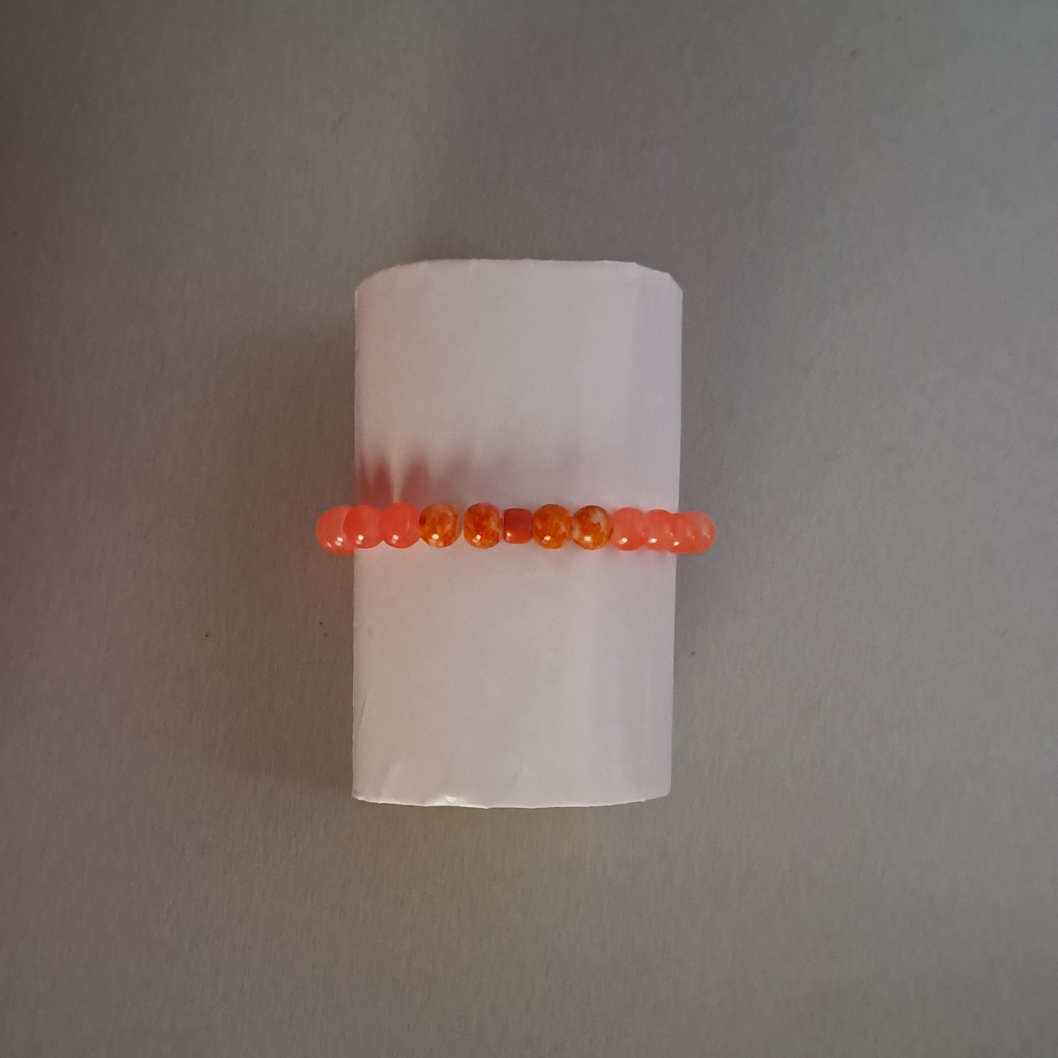 دسبند نارنجی باطرح خاص 