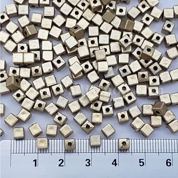 مهره دوختنی مات طلایی