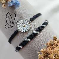 ست دستبند بابونه مشکی سفید ( با نخ چرم بافت خورده) مناسب هر سلیقه