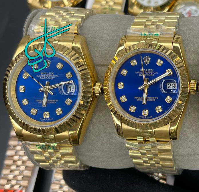 خرید ست ساعت زنانه و مردانه رولکس موتور ژاپن ایندکس نگینی کیفیت عالی رنگ ثابت سایز بزرگ کد 2116120 - ردگل