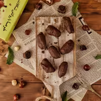 خرما روکش شکلات بدون مغز 300 گرمی کاکائویی هاما