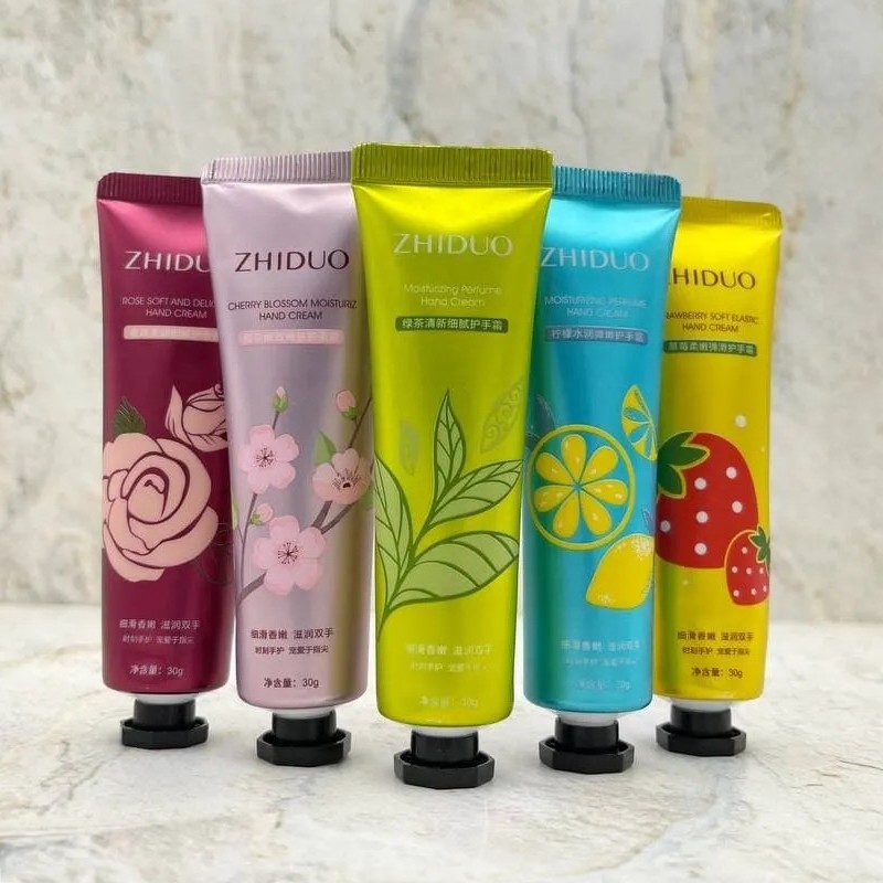 کرم دست رایحه گل ZHIDUO (جلد صورتی رنگ شکوفه دار)