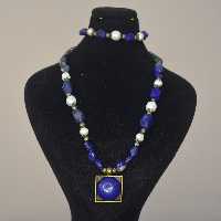 ست گردنبند و دستبند دستساز با سنگ لاجورد افغان و مروارید پرورشی 