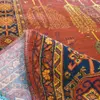 فرش ماشینی هیوا طرح بلوچ کد 3-212 زمینه لاکی