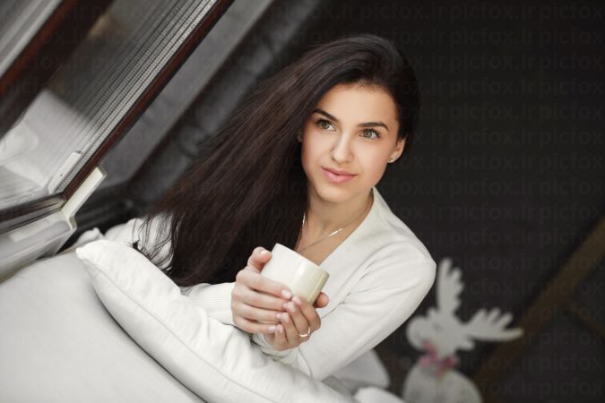 خرید و دانلود عکس Happy young woman drinking coffee کد 25034 | پیک فاکس | Pic Fox