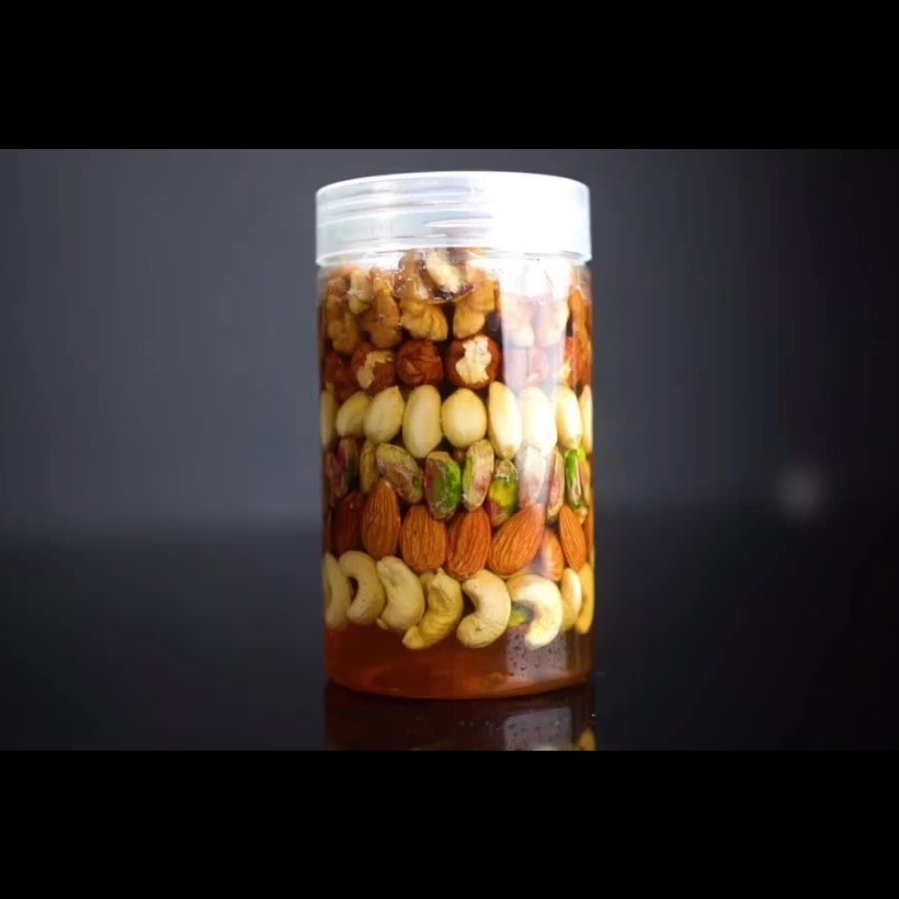 معجون عسل 6مغز خالص 400 گرمی. محتویات (مغز بادام، پسته، بادام زمینی، فندق، بادام هندی و گردو)
