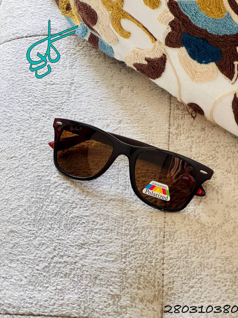 خرید عینک اسپرت برند Rayban دارای استاندارد UV400 فرم کائوچو همراه کاور و دستمال کد 2415325 - ردگل