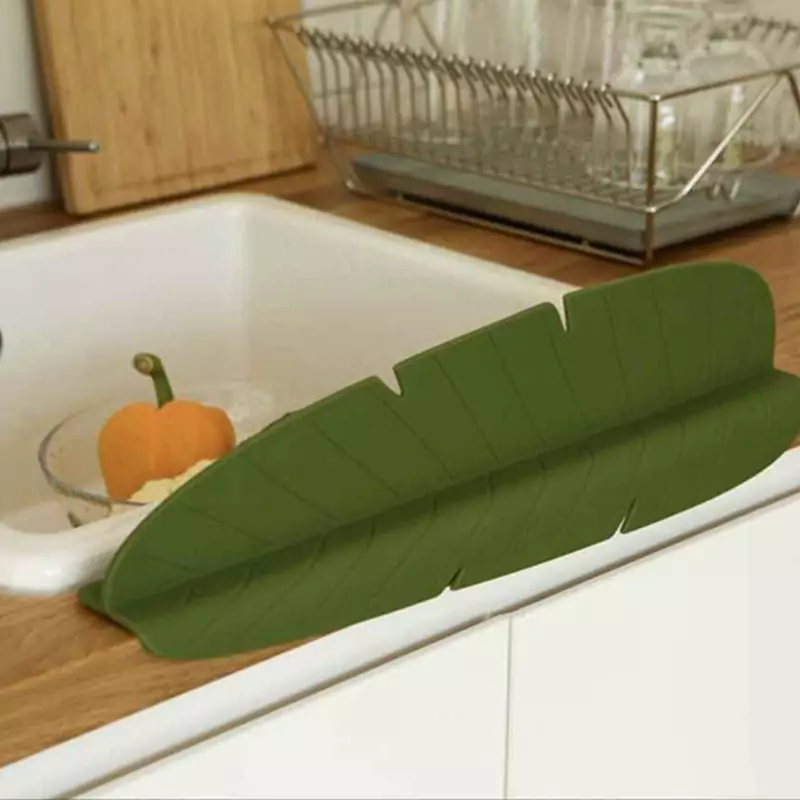 آبگیر سینک ظرفشویی سیلیکونی طرح برگ برای جلوگیری از ریخته شدن آب به روی لباس در هنگام شستشو  قابل نصب روی همه نوع سینک