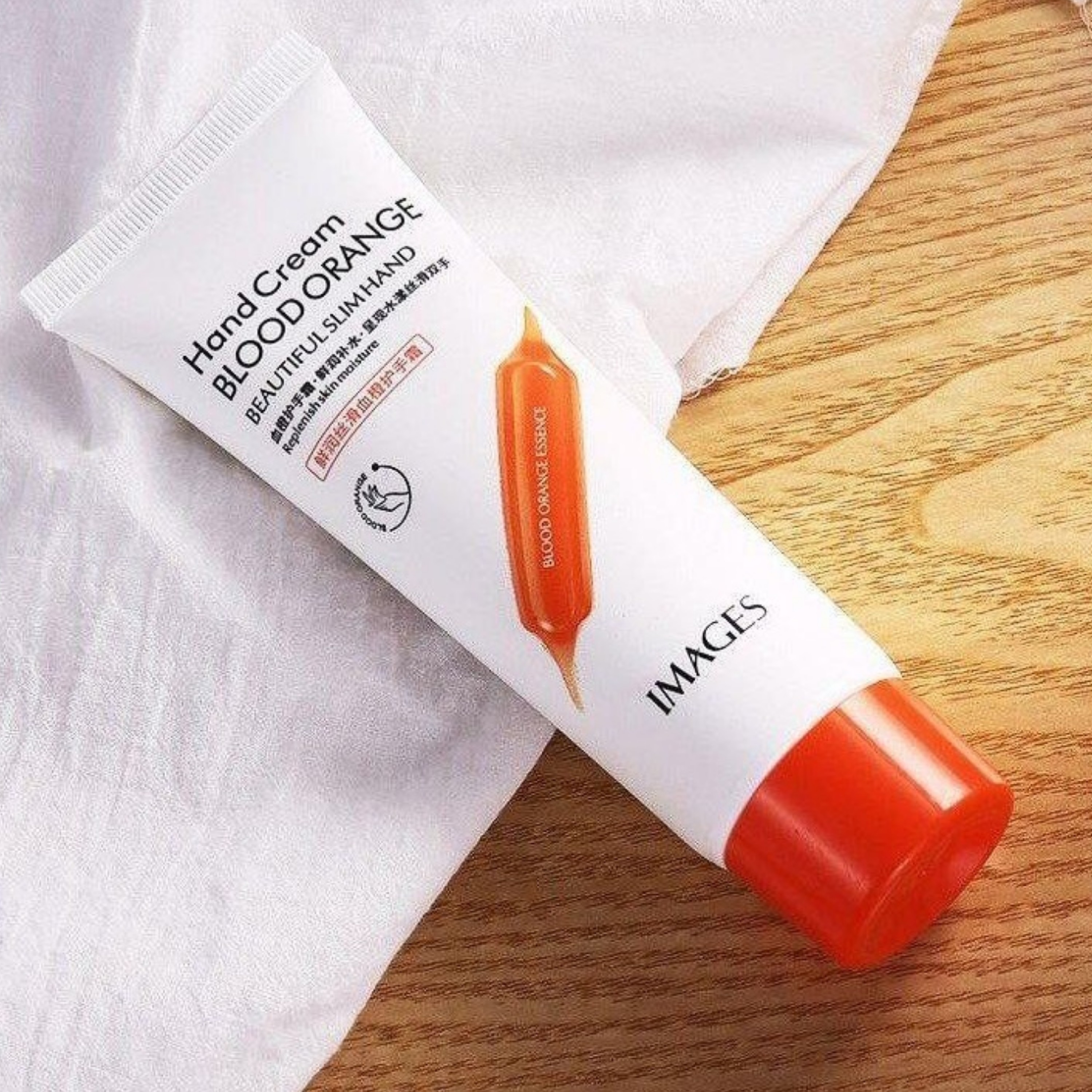 کرم مرطوب کننده و ضد خشکی و ترک و کاهش تیرگی دست پرتقال خونی برند ایمجیز