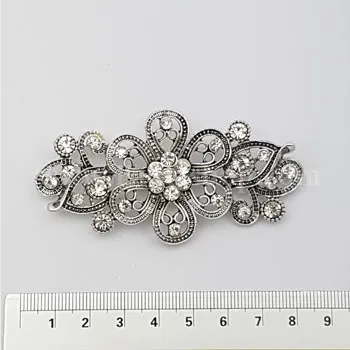 گل سینه جفتی نقره ای